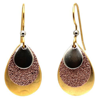 Mixed metal layered teardrop earrings with 18kt gold over surgical steel ear wire.
