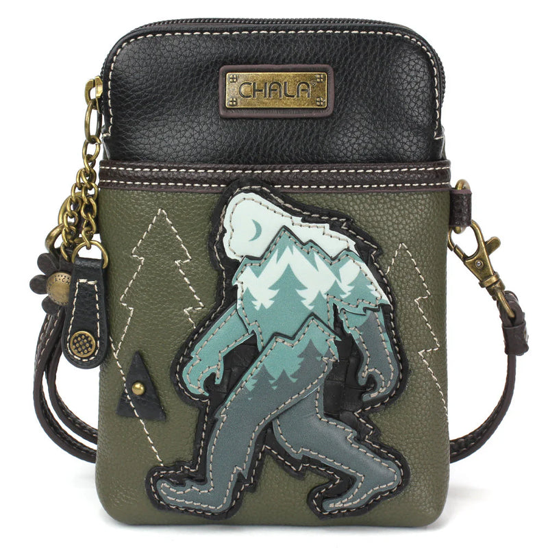 Compact crossbody bag with Bigfoot Chala Pal design, zip closure, card slots, and adjustable strap for multiple carry options