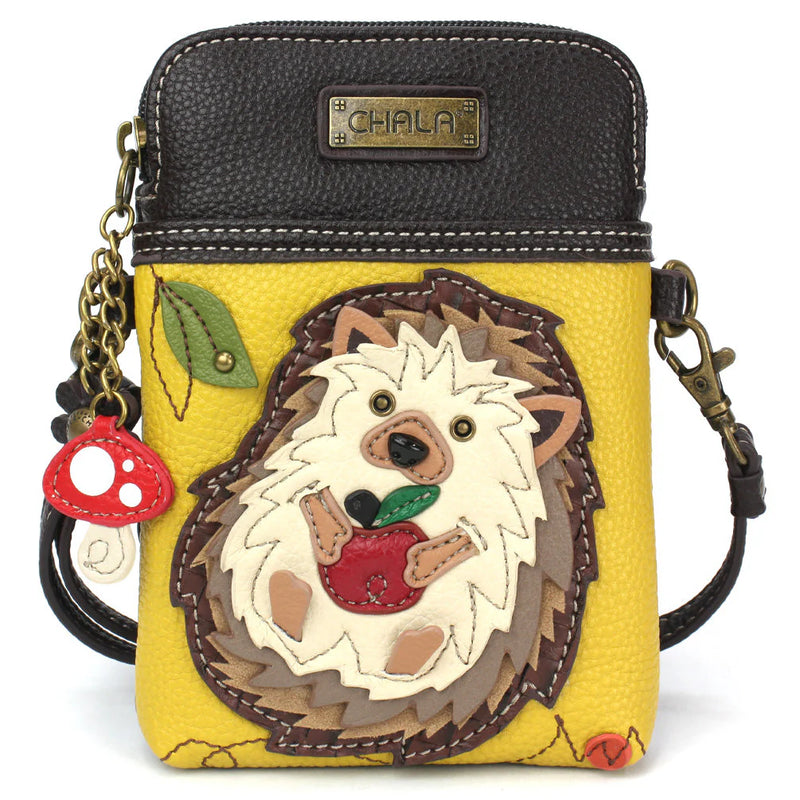 Mustard yellow Chala crossbody phone bag with cute hedgehog applique.