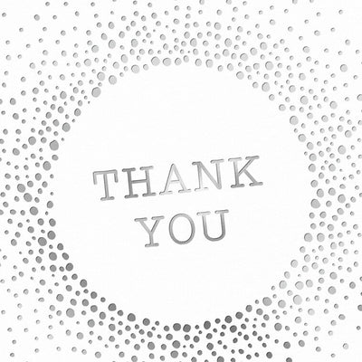 White thank-you cards with silver foil dots radiating from center text and matching envelopes.
