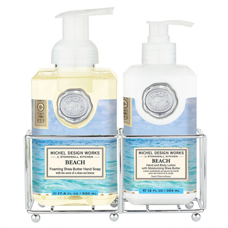 Michel Design Works Beach hand soap and lotion set in silver caddy with coastal ocean-themed packaging.
