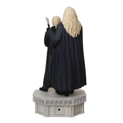 Hallmark Keepsake ornament of Lucius and Draco Malfoy in black robes standing on stone base, light and sound Chamber of Secrets Collection