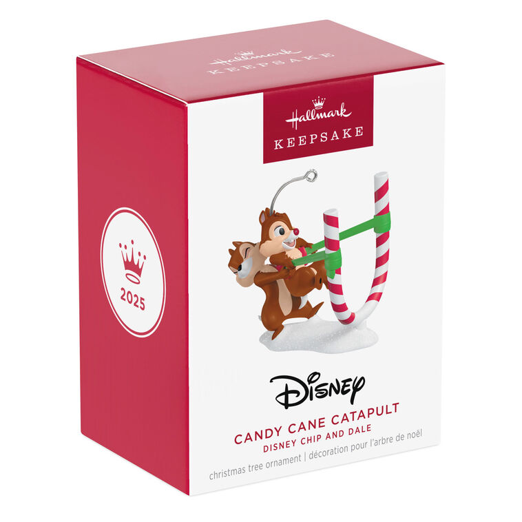 Chip launches Dale from a candy cane catapult in this playful Hallmark Keepsake Disney Christmas ornament with snowy base.