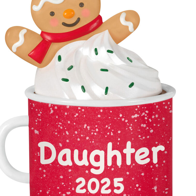 2025 Christmas ornament of gingerbread daughter cookie in red mug with whipped cream, festive holiday design

