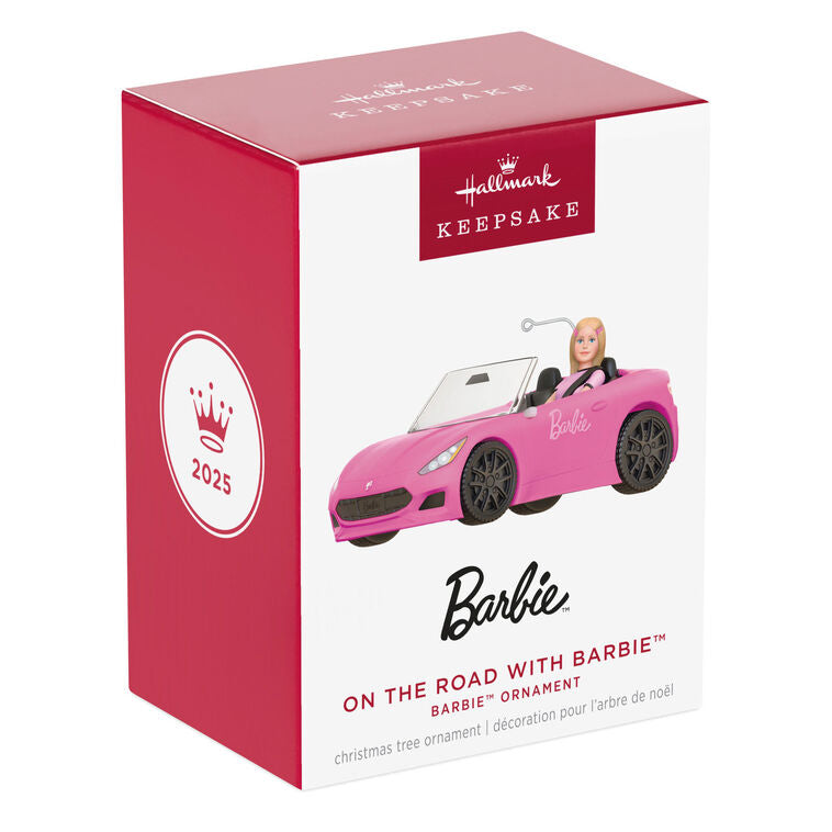 Barbie ornament driving a pink convertible sports car, wearing pink tee and barrettes, Hallmark Keepsake holiday decoration.