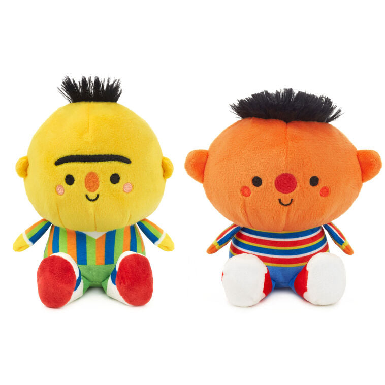 Plush Bert and Ernie toys with magnetic connectors, colorful outfits, and embroidered Sesame Street features.
