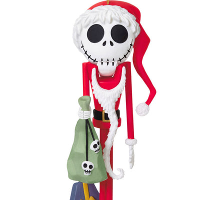 Santa Jack Skellington nutcracker ornament in red suit with moving mouth from The Nightmare Before Christmas.

