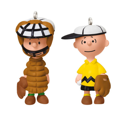 Set of two mini ornaments: Charlie Brown in baseball hat and glove, Schroeder in catcher’s gear, Hallmark Peanuts Christmas collectibles
