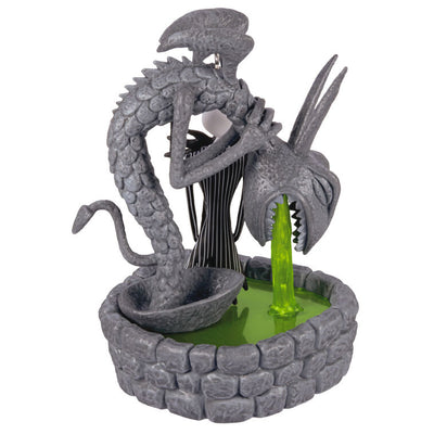 Jack Skellington in Halloween Town fountain ornament with glowing green light from The Nightmare Before Christmas.

