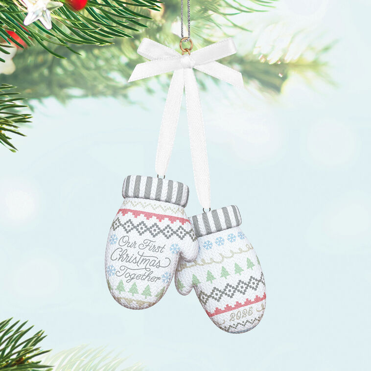 Porcelain Christmas ornament with pair of colorful knit mittens and “Our First Christmas Together 2025” message

