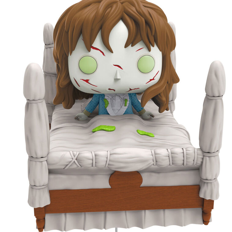 Funko POP! ornament of possessed Regan from The Exorcist in four-poster bed with spinning head motion