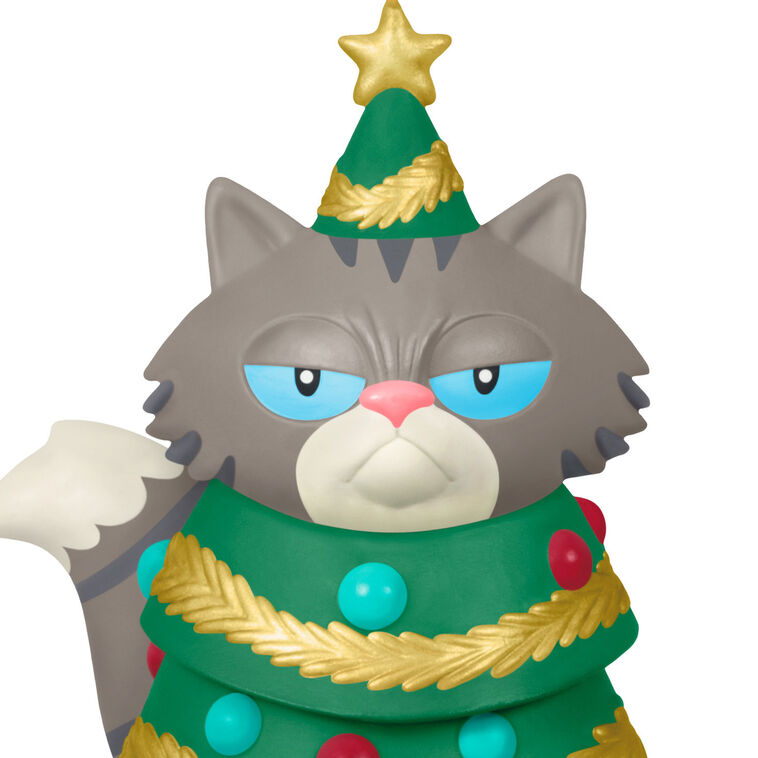 Gray-and-white tabby cat Christmas tree ornament with grumpy face, wearing festive garland and gold star

