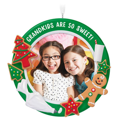 Photo frame ornament with cookies, milk, and frosting bag, celebrating grandkids with festive Christmas design

