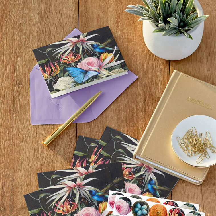 Elegant floral note cards by Marjolein Bastin on black background with coordinating round floral and robin’s egg seal stickers.
