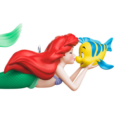 Ariel ornament from The Little Mermaid holding Flounder and giving him a kiss, with her green tail curled beside her