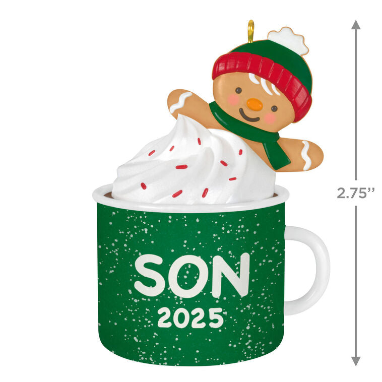 2025 Christmas ornament of gingerbread son cookie in green mug with whipped cream, festive holiday design

