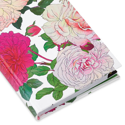 Password keeper book with fuchsia and cream floral cover, alphabetical tabs, and striped end sheets.
