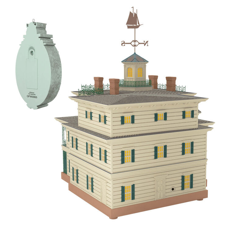 Disney Haunted Mansion tree topper with synchronized light and sound show, remote control activation, and glowing Disney