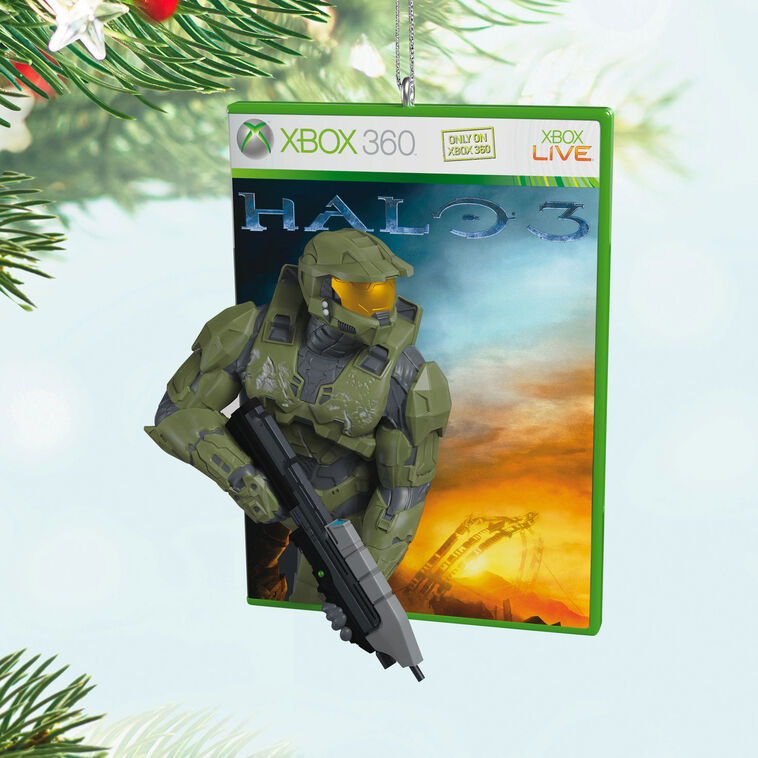 Halo 3 ornament, Master Chief with assault rifle, green disc case, orange sunset background, Hallmark Keepsake, Christmas tree decoration.