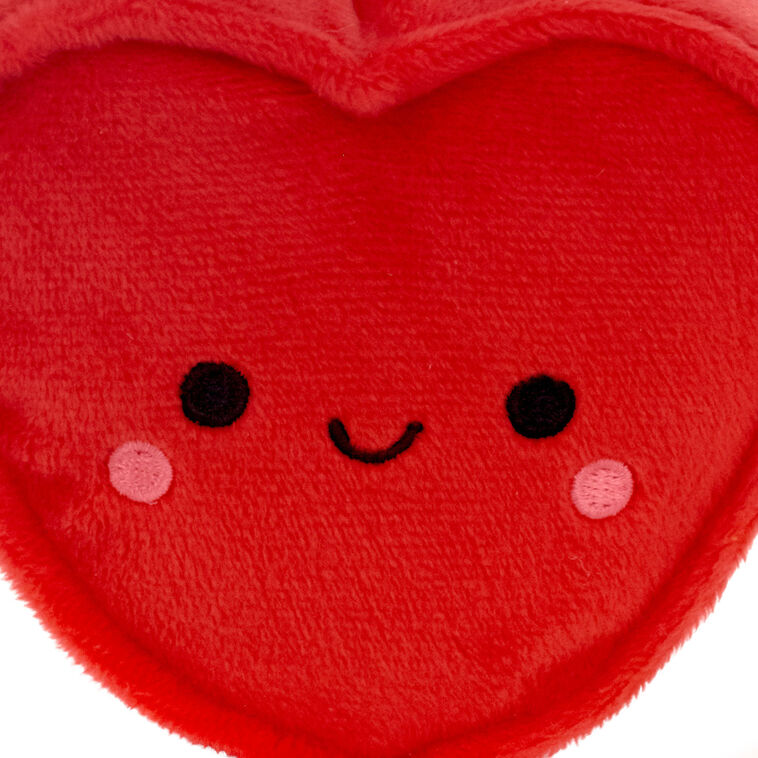 Red plush heart gift card holder with smiling face, blushing cheeks, and a pocket on the back for cash or cards.

