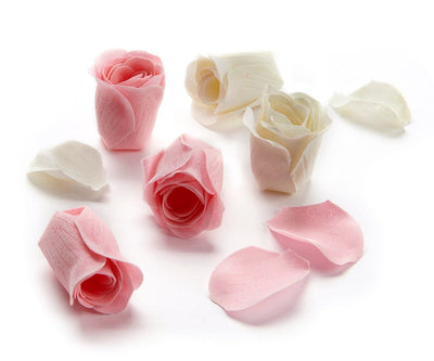 A boxed gift set of six flower-shaped soap petals with pink jasmine scent, beautifully packaged for gifting.

