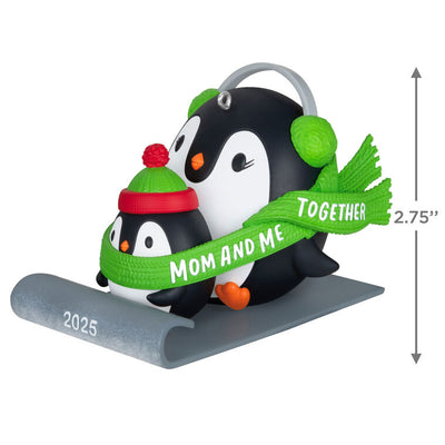 2025 Christmas ornament of mom and child penguins sledding together, green scarf with sweet message, festive holiday decor

