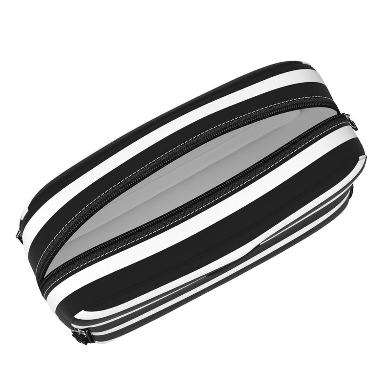 Late Bloomer 3-Zip toiletry bag with three compartments for organizing toiletries, makeup, or school supplies; stands upright.