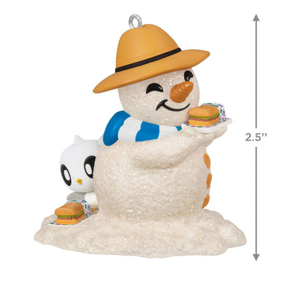 Hallmark Keepsake Sandal the Sandman ornament—sand snowman in Bermuda hat, blue and white scarf, with sub sandwich and sea turtle friend on the beach
