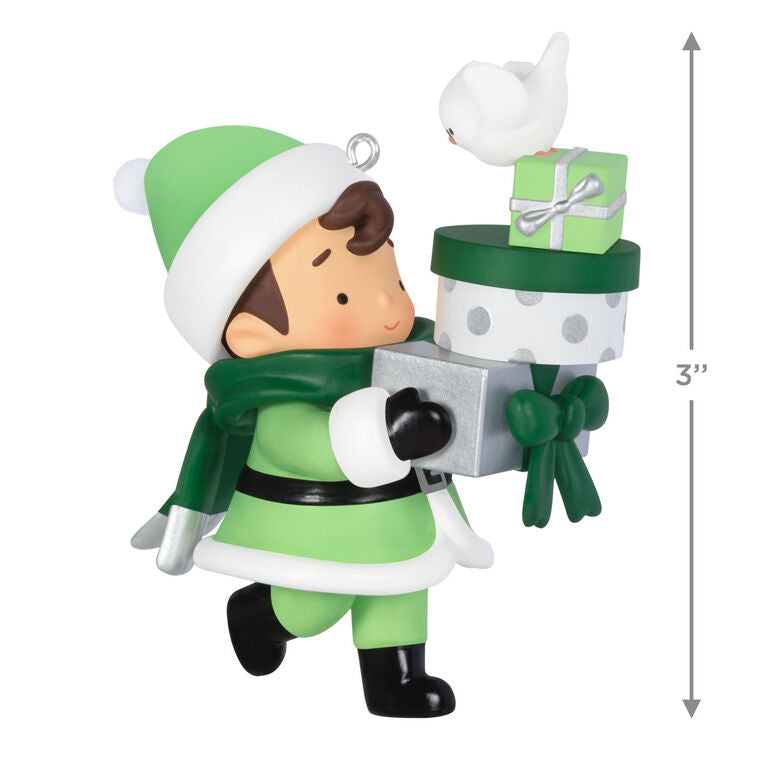 Mystery ornament featuring Young Santa in festive outfit holding presents and a bird, blind-boxed surprise