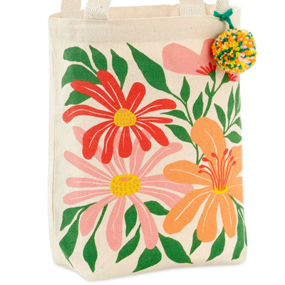 Hallmark 10.5-inch wildflowers fabric gift bag with retro floral design and pom-pom
