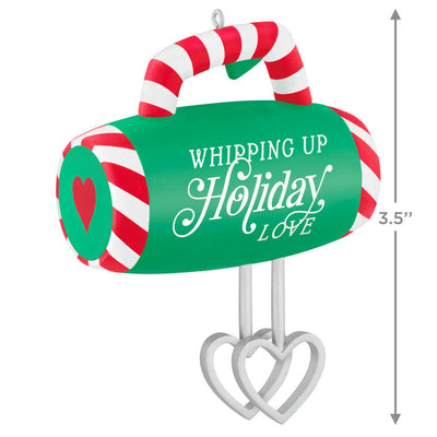 Green hand-mixer Christmas ornament with candy cane stripes and heart-shaped beaters, festive holiday kitchen decor


