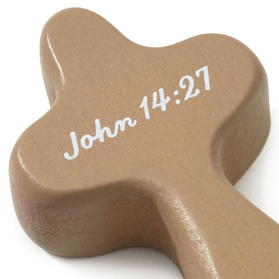 Hallmark Peace mini comfort cross with white text and John 14:27 Bible verse on light stained wood.
