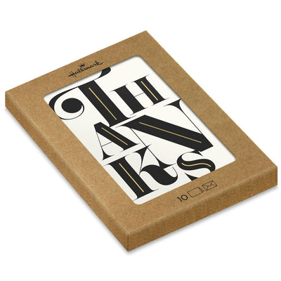 Modern black and white thank-you cards with bold uppercase lettering and gold foil details.
