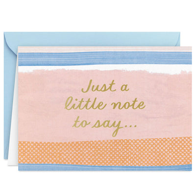 Note cards with pink, blue, and orange brushstroke stripes and gold script reading “Just a little note to say…”, boxed with envelopes.
