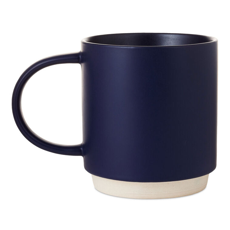 Midnight blue ceramic mug with "Keep it reel" pun, fishing rod and lure design, oversized handle, and recessed stacking base.