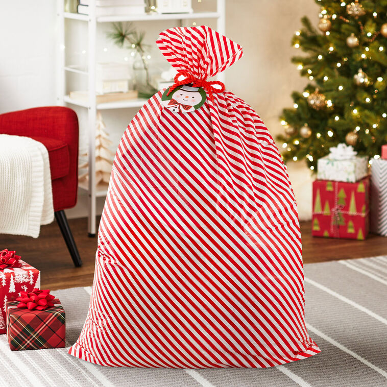 56" Red and White Striped Giant Plastic Christmas Gift Bag With Snowman Tag and Tie