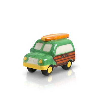 Toy car in green with a surfboard strapped to the roof