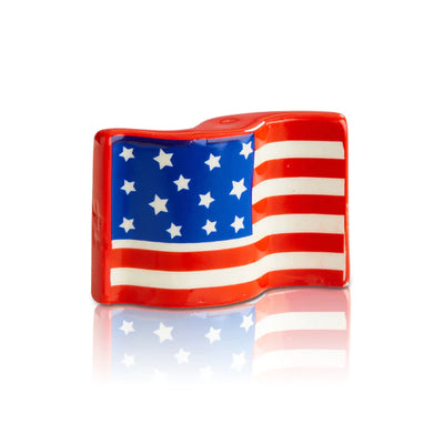 Mini ceramic American flag on a white background