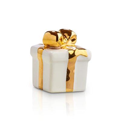 White gift box with a gold ribbon tied in a bow