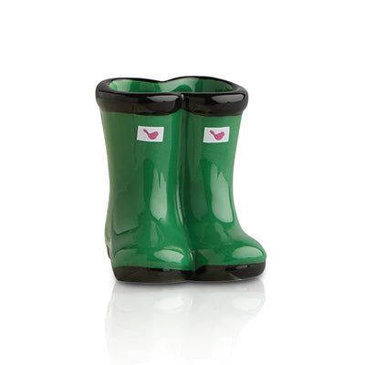 Pair of green rain boots on a white background.