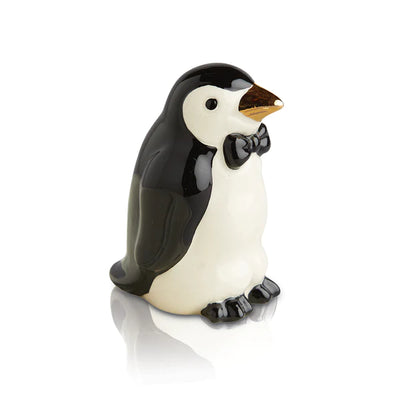 Black and white penguin wearing a bow tie. 