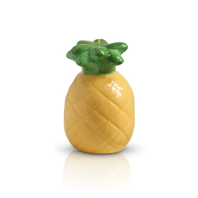Yellow ceramic pineapple with green leafy top