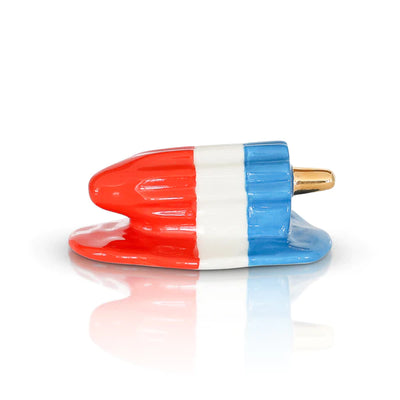 Red, white, and blue popsicle with a gold tip on a white background