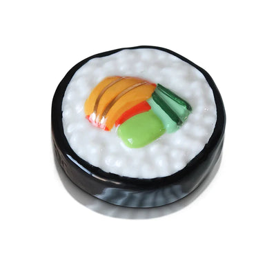 Close-up photo of sushi roll with rice and vegetables