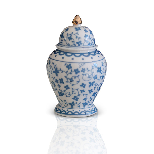 Nora Fleming blue and white ginger jar mini with intricate design; classic year-round home decor accent; hand wash only.

