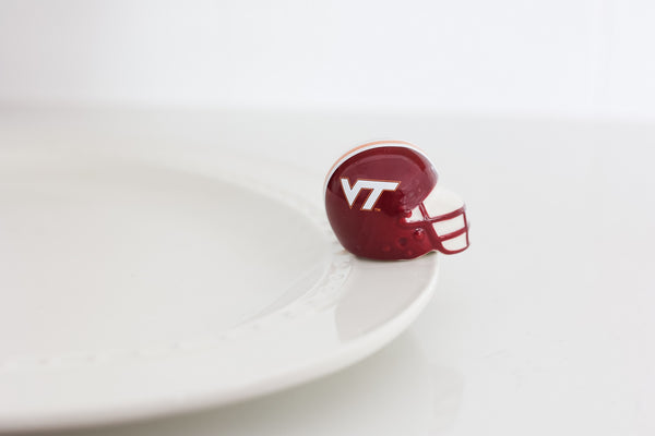 Nora Fleming Virginia Tech football helmet mini in maroon and orange; licensed collegiate decor for tailgating.

