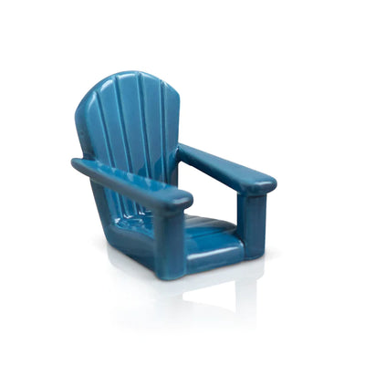 Blue lawn chair with white armrests on white background