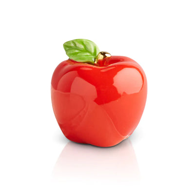 Red apple with green leaf on white background. 
