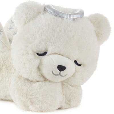 Hallmark angel bear plush toy with silver halo and embroidered wings plays instrumental 'Amazing Grace' lullaby at the press 
