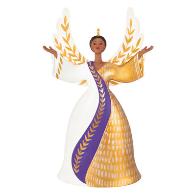 Angel ornament in gold, white, and purple gown with raised hands and detailed wings, a radiant Hallmark Keepsake holiday symbol of faith.